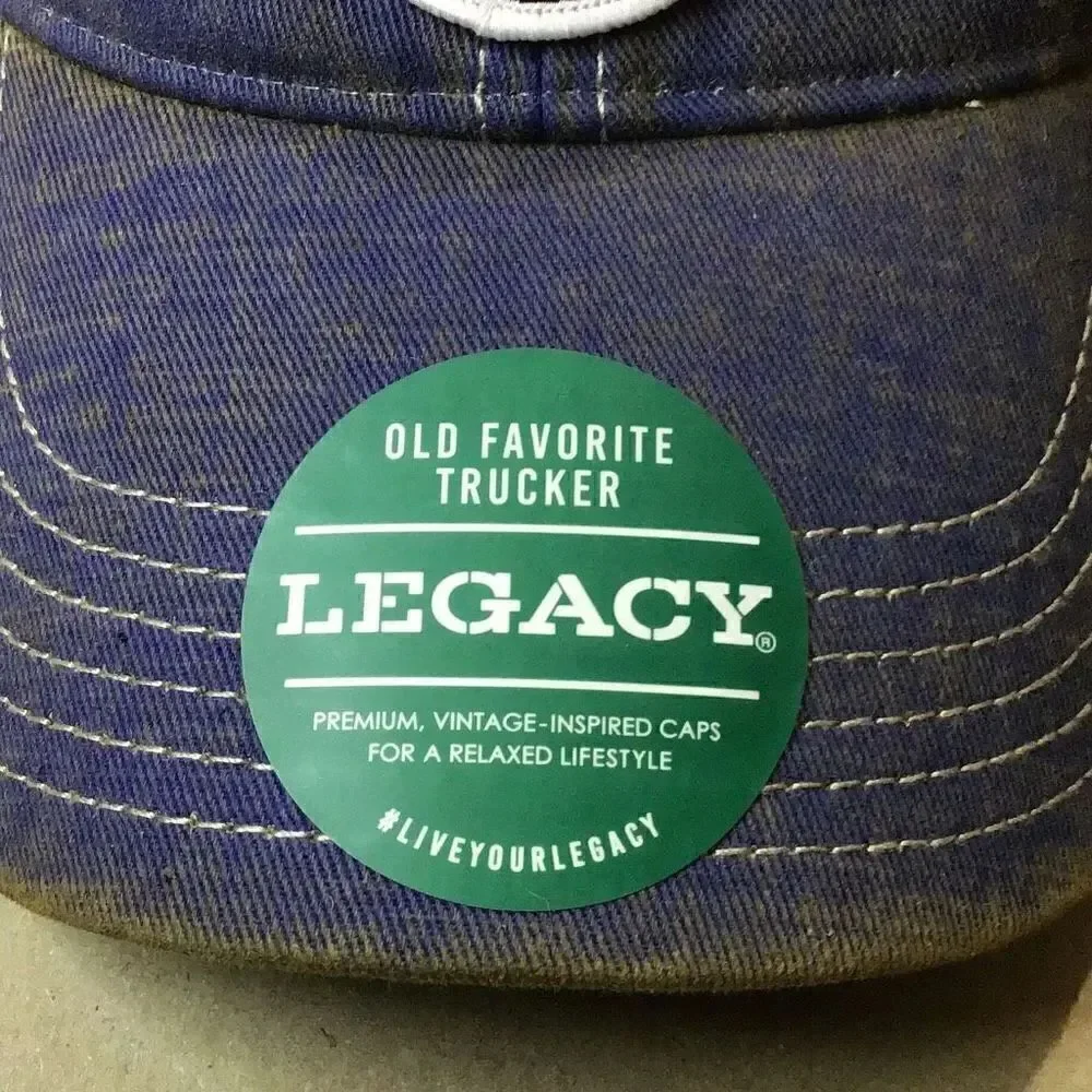 Vintage legacy ladies, trucker hat. She’s a pistol.